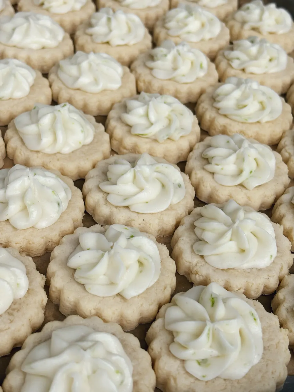 Coconut lime mini cookies with piped frosting
